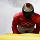 At the Pyeongchang 2018 Winter Olympics, men's skeleton gold medallist Yun Sung-bin of South Korea arrives at the finish area.